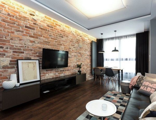 brick tv wall in an amazing modern living room