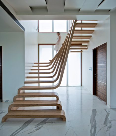 amazing wavy wooden staircase