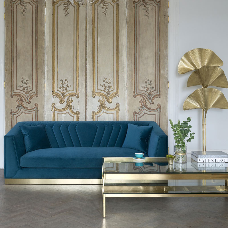 blue sofa with gold touch luxazin