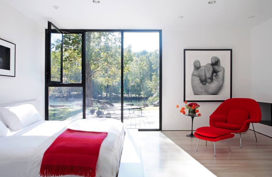 modern bedroom red chair black and white