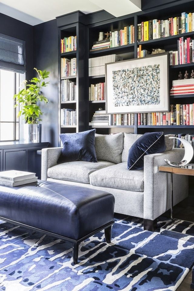 bold colors reading room with hanging art work luxazin